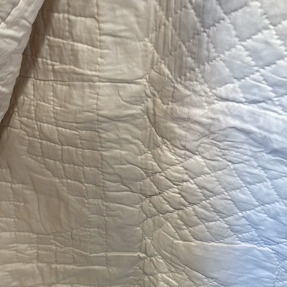 Appliqued and embroidered quilt